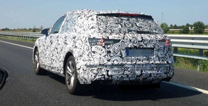 На испытательной трассе фотошпионы засекли прототип гибридного Audi Q7